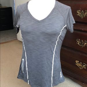 Reebok Tee: Side Zipper Pocket